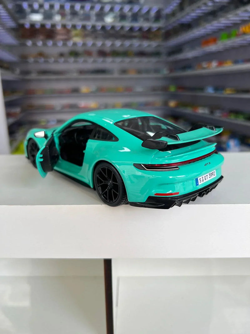 Porsche 911 GT3 2021 azul 1:24 Maisto