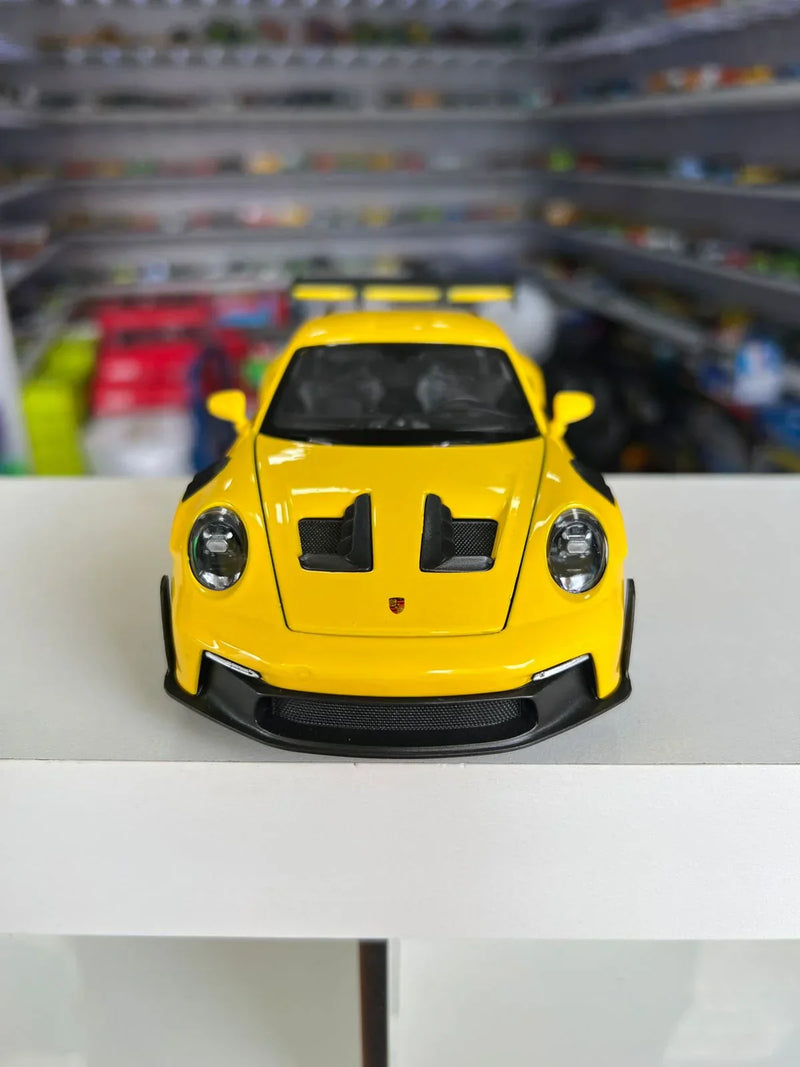 Porsche 911 GT3 RS amarelo 1:24 Maisto