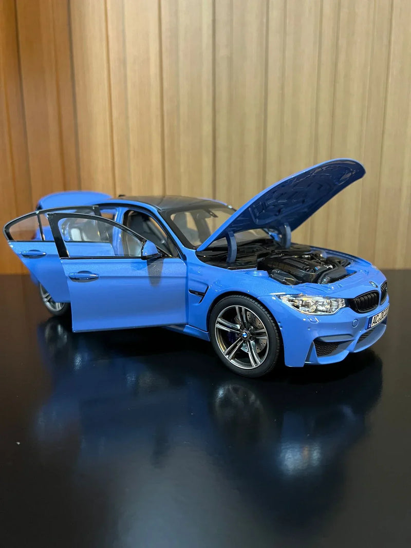 BMW M3 F80 Competition azul 1:18 Norev