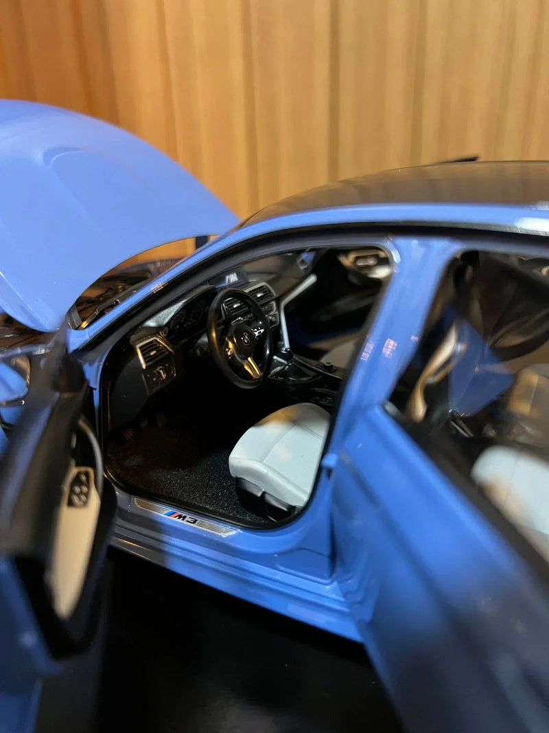 BMW M3 F80 Competition azul 1:18 Norev