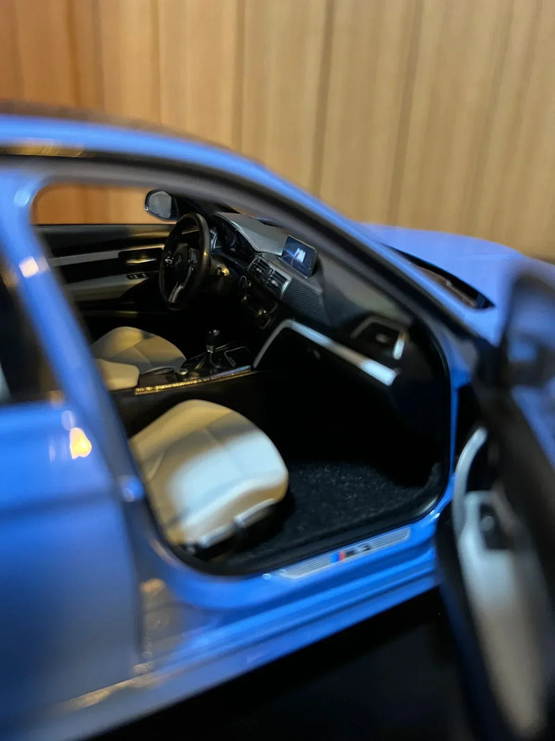 BMW M3 F80 Competition azul 1:18 Norev
