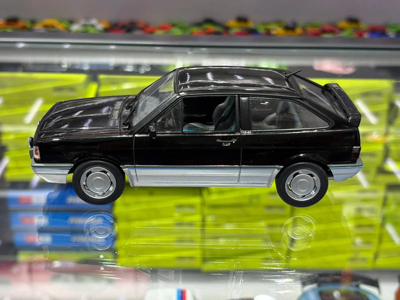Volkswagen Gol GTI (1994) - Preto Universal - 1:24 - California Toys